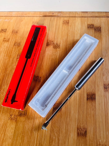 Coupe-fromage vintage Stelton of Denmark en inox par par Peter Holmblad