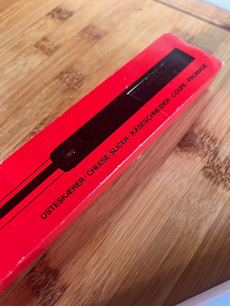 Coupe-fromage vintage Stelton of Denmark en inox par par Peter Holmblad