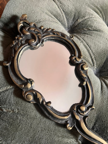 Miroir face à main vintage en bronze