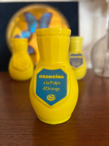 Porte-pailles de bistrot vintage Orangina en plastique jaune - Années 60/70