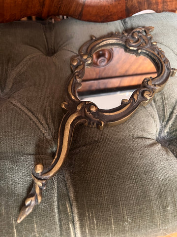 Miroir face à main vintage en bronze