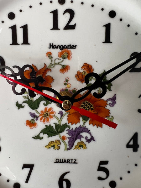 Horloge / pendule assiette Hangarter quartz en porcelaine Deshoulières France