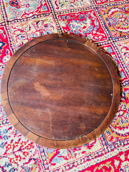 Miroir rond ancien en placage d'acajou