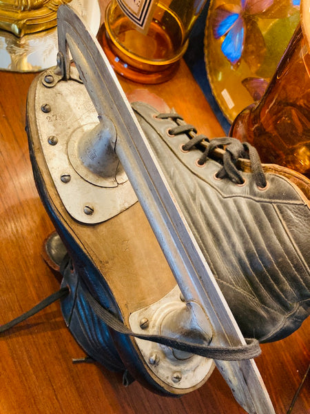 Paire de patins à glace vintage BMV en cuir