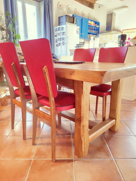 Ensemble de 4 chaises vintages en skaï rouge et bois - Le Sélectionneur - Brocante en ligne
