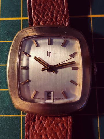 Montre Lip mécanique avec dateur - Années 70 - Le Sélectionneur - Brocante en ligne