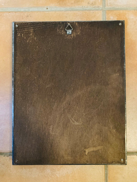 Miroir vintage signé à suspendre en plomb plissé