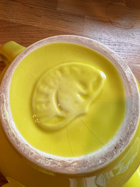 Théière de la marque de thé Eléphant en faïence verte / jaune