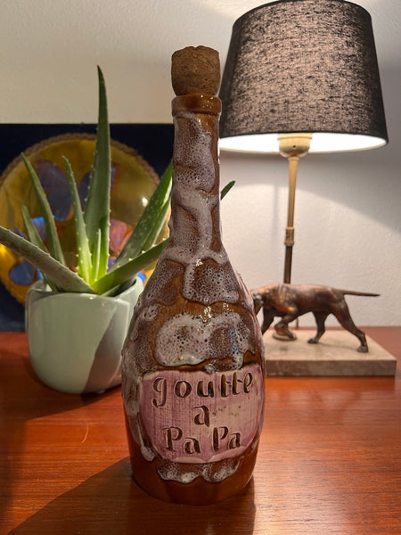 Bouteille vide vintage Goutte à Papa en céramique