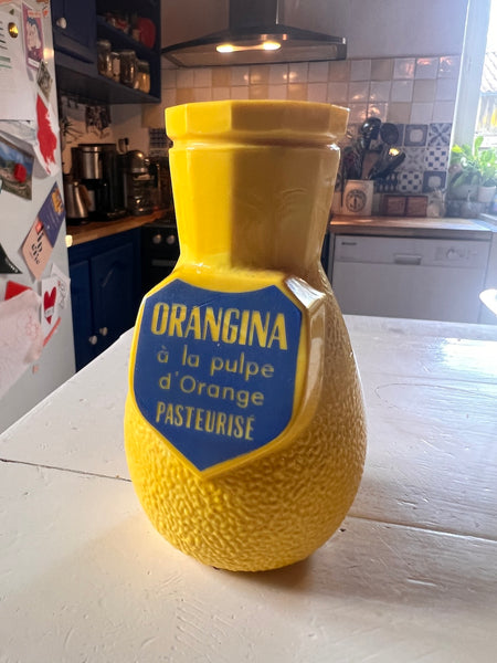 Porte-pailles de bistrot vintage Orangina en opaline jaune - Années 60/70